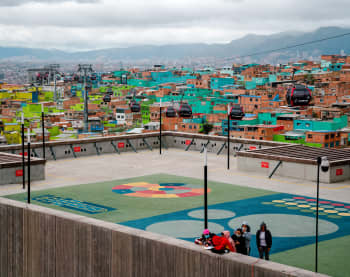 View over terrace, colourful houses and city rooftops
