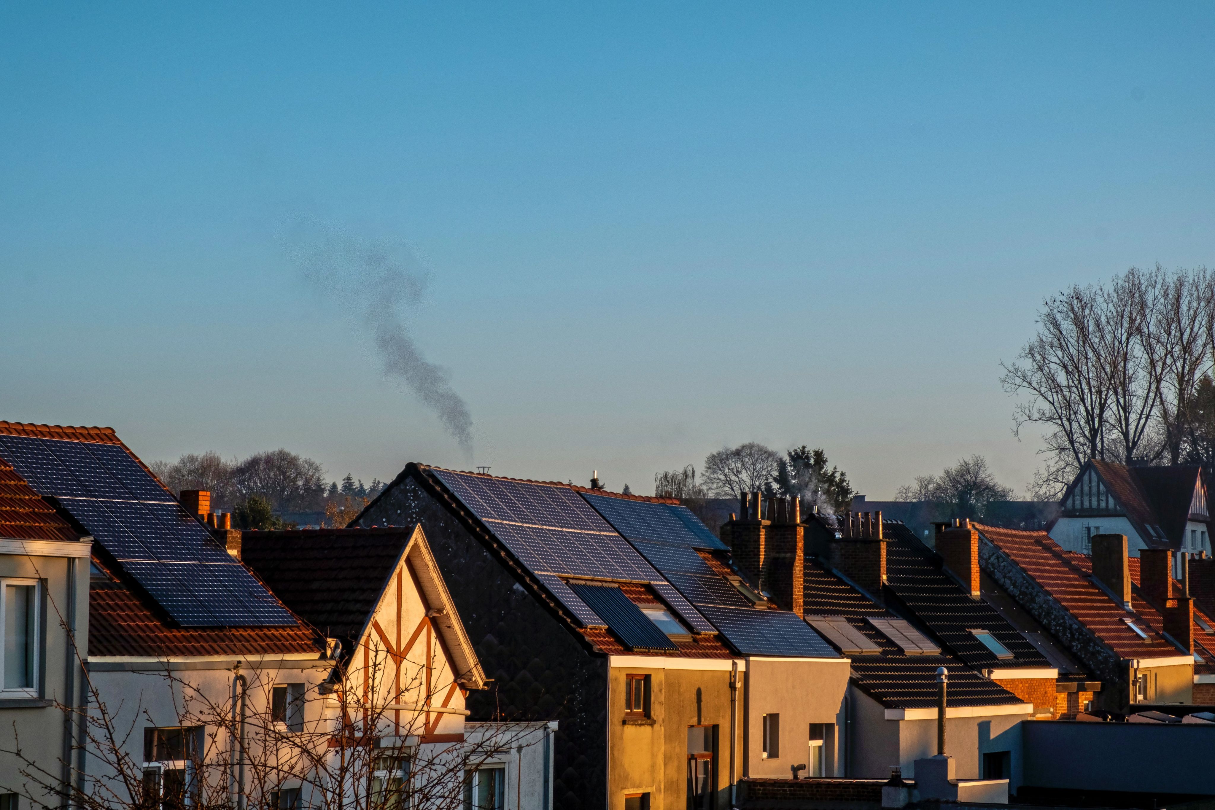 Row of house roofs with solar panels