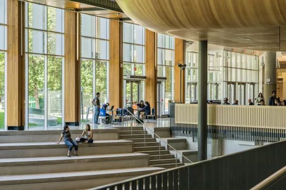 Student presenting in seminar room