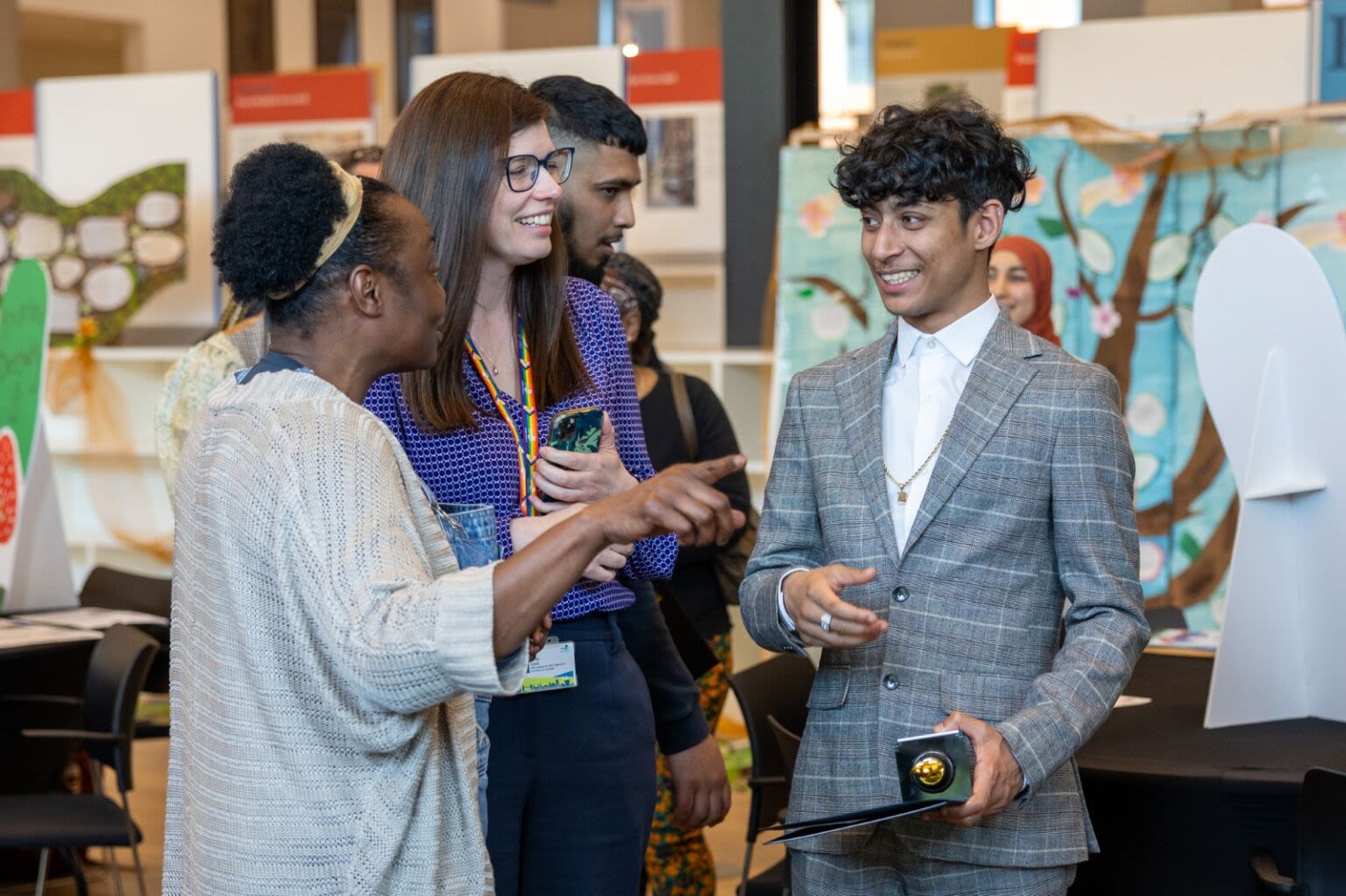 Tower Hamlets-based citizen scientist Keyaan Ahmed explaining his research to Council staff during a showcase event.