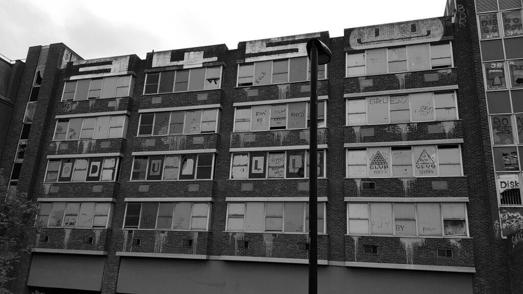 White and black building during day time
